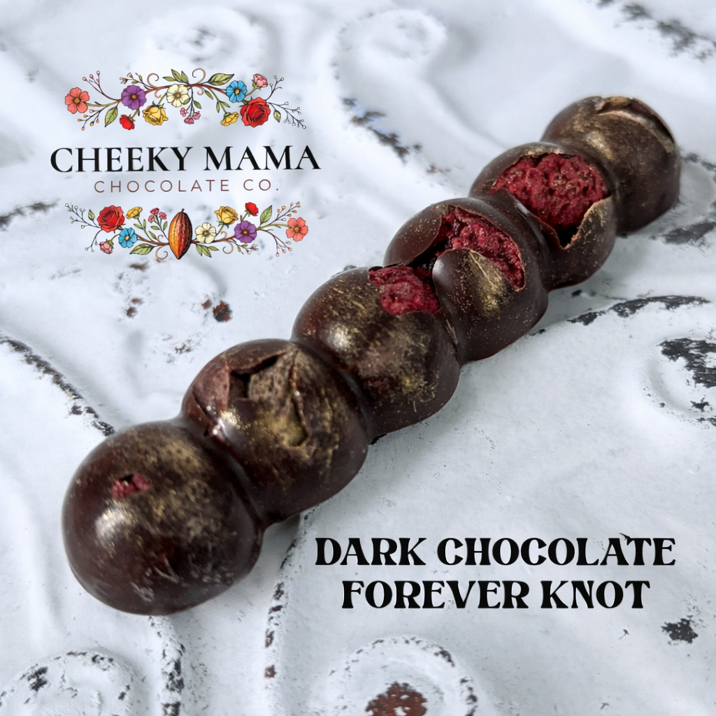 dark chocolate wedding favour with raspberries and pistachios