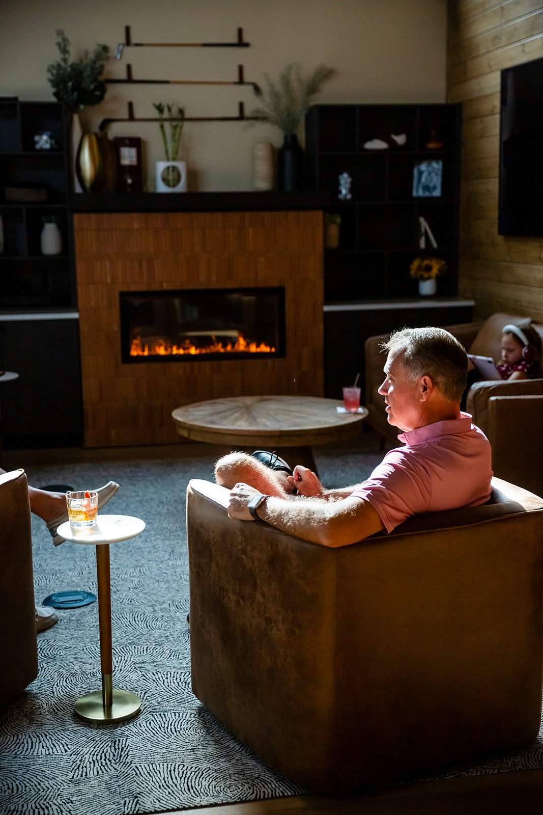 People toasting with red wine in outdoor setting