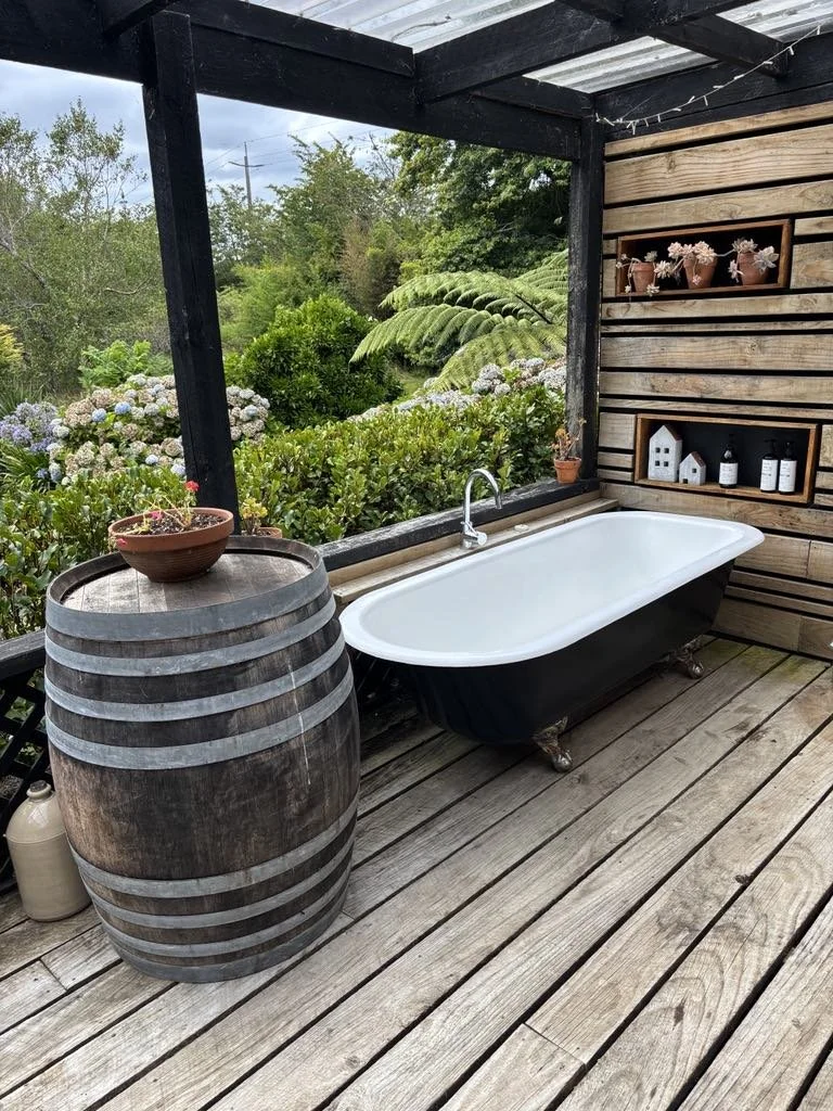 Enter onto a private deck with outdoor bath for two!