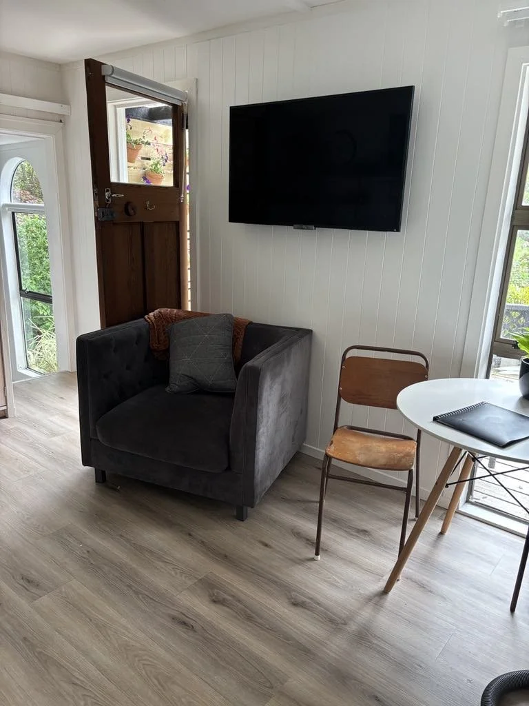 Dining and lounge area with Smart TV.