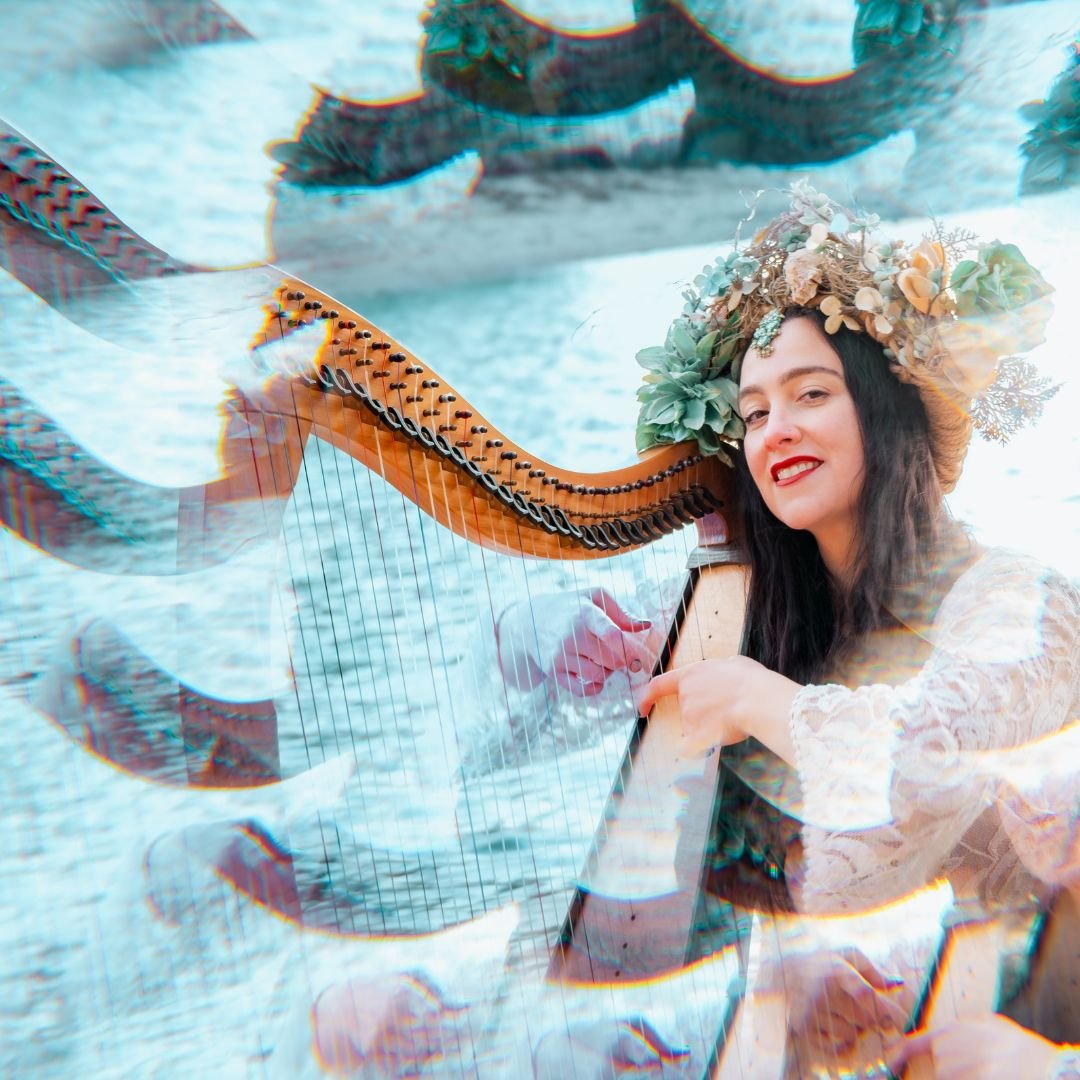 Woman with floral crown playing a harp with a kaleidoscope effect overlay.