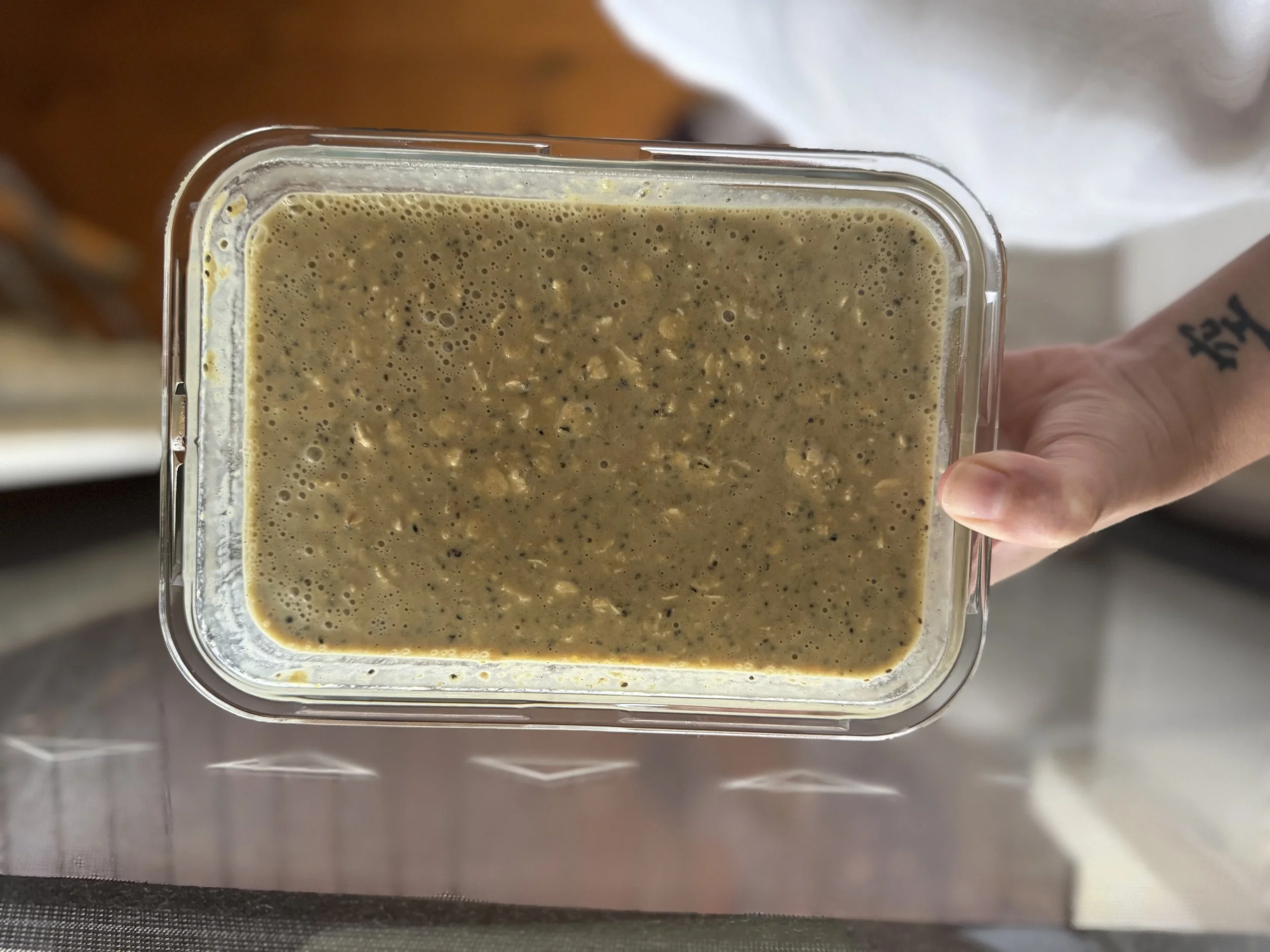 All the ingredients mixed up in a glass container