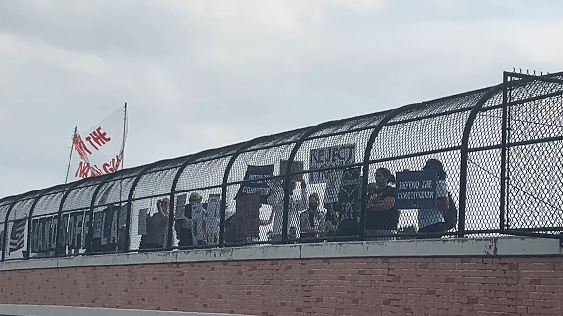 Healthcare Not Warfare Sign Wave