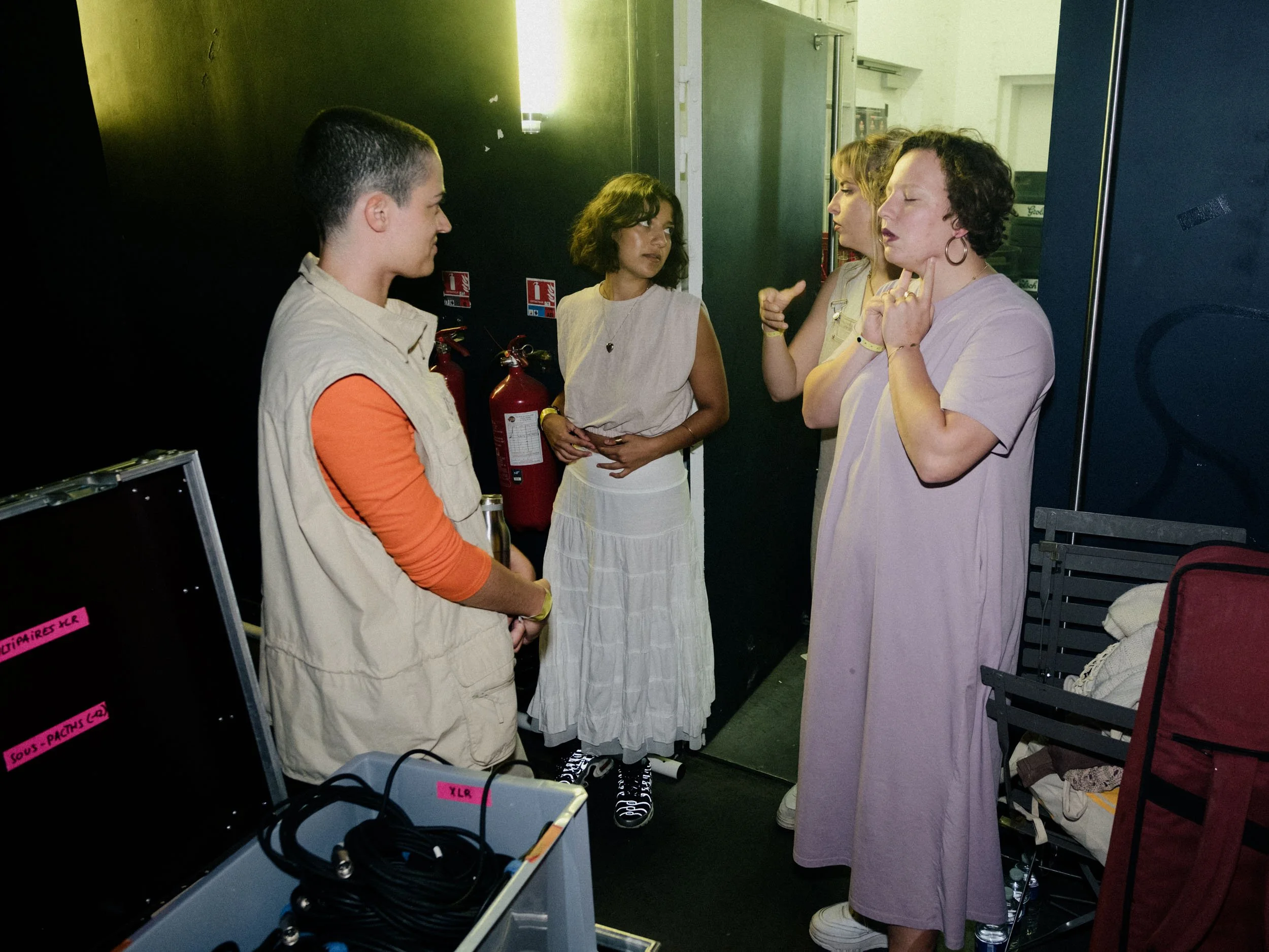 Calypso and her backing singers are getting ready for the concert.