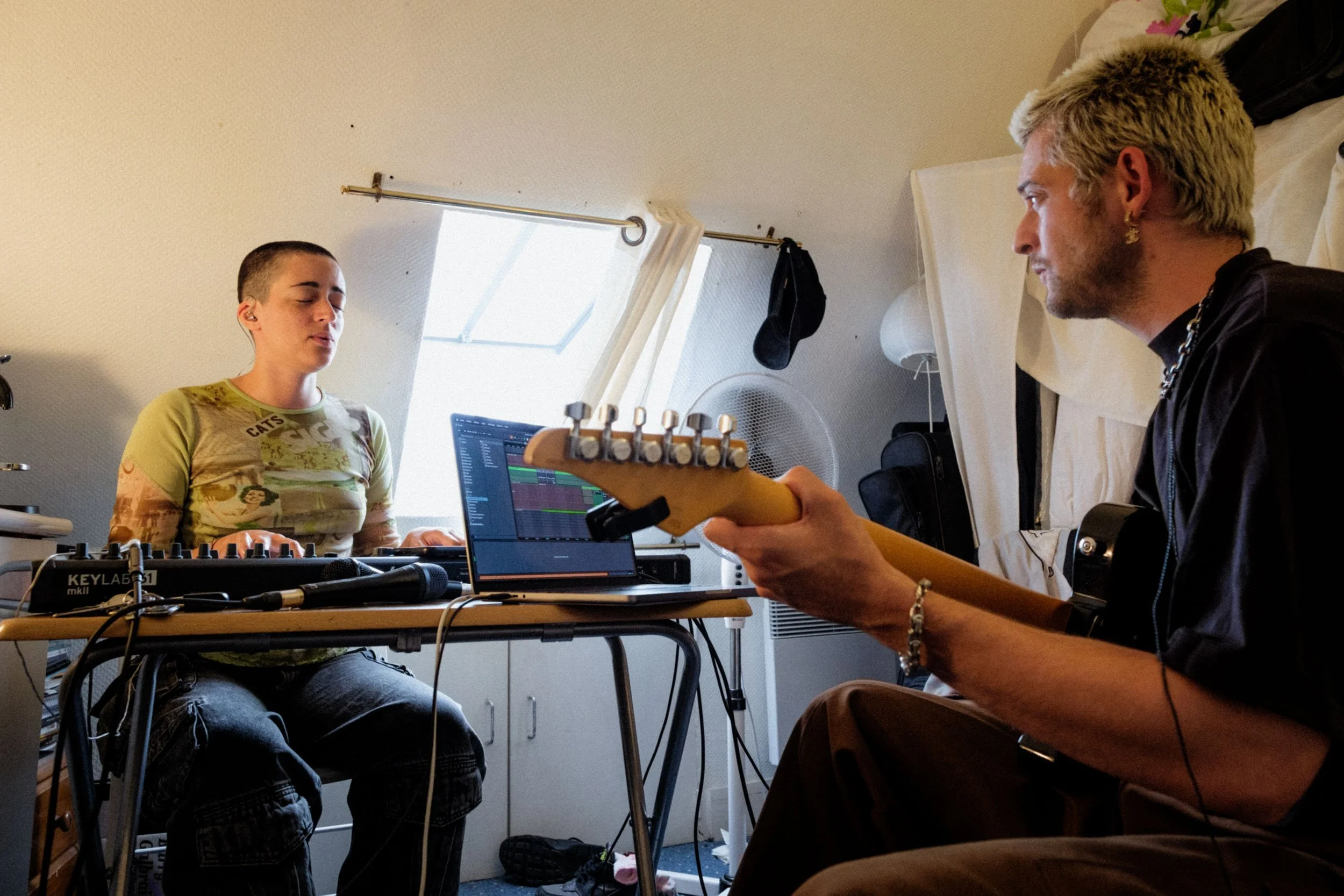 Calypso writes and performs the songs, and also plays the piano. Victor handles arrangements, backing vocals and guitar.