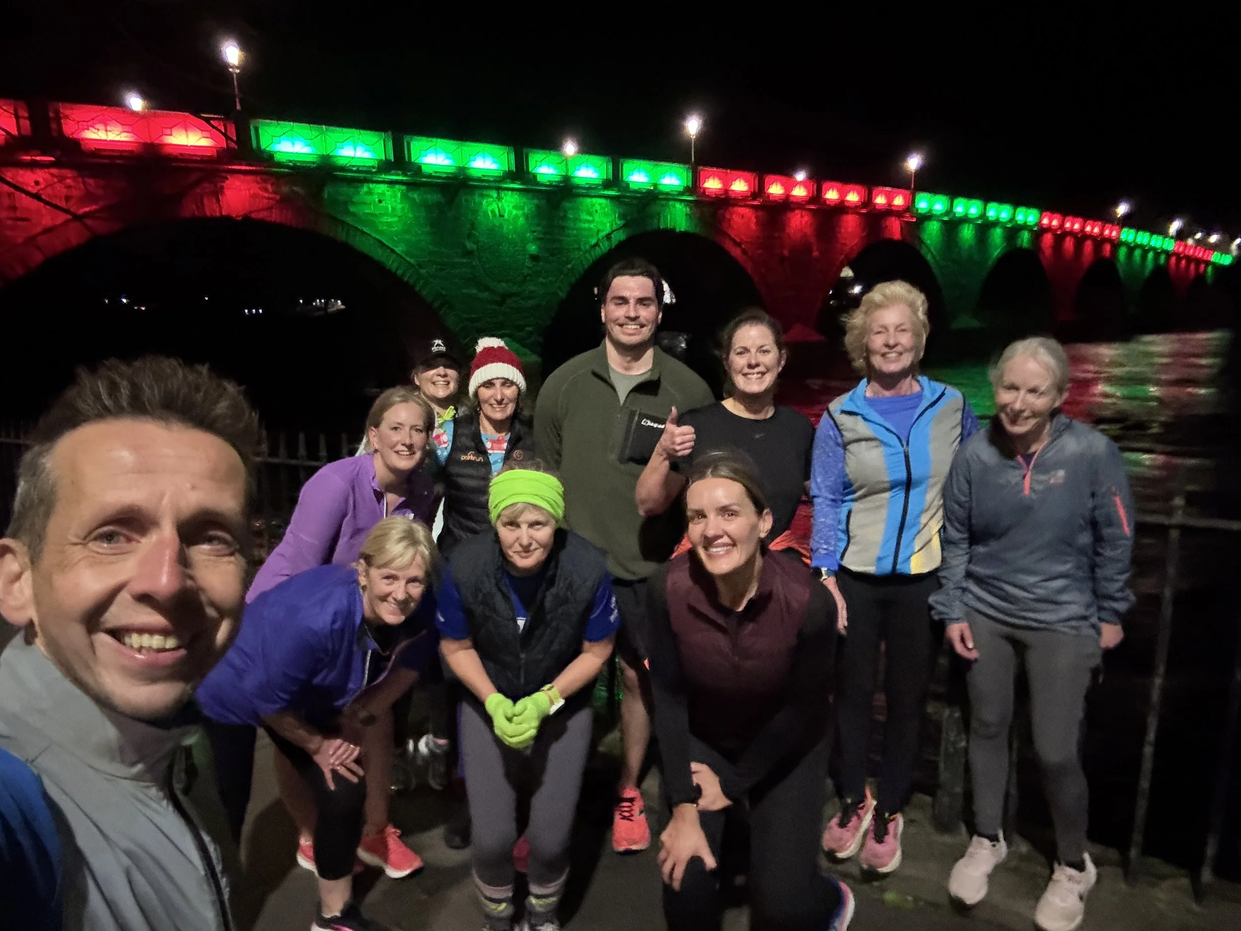 Run Group Members posing for a photo at the end of a session
