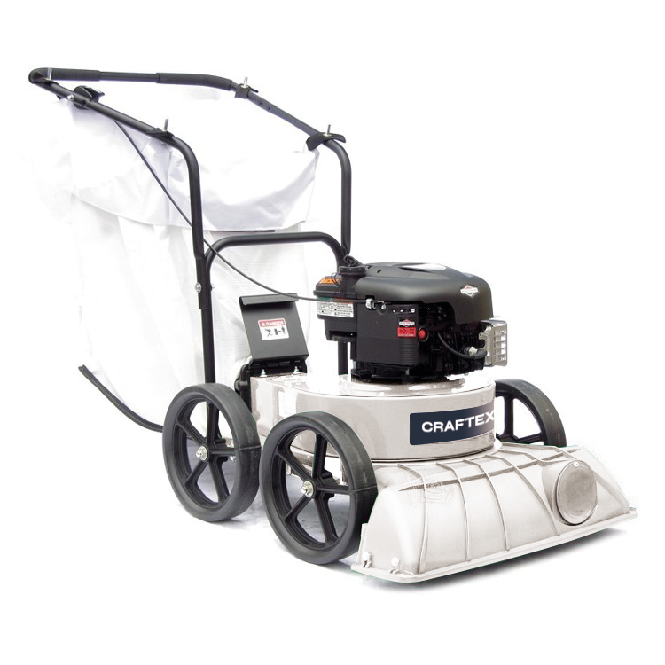 A Craftex walk-behind lawn edger with a black and white color scheme, four large wheels, and a handle with a white grass guard attached.