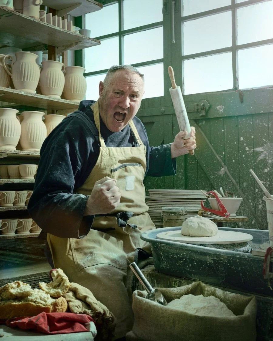 Playful portrait of ceramicist Keith Brymer Jones in his pottery studio, shot by London-based photographer Phil Fisk for Observer Food Monthly