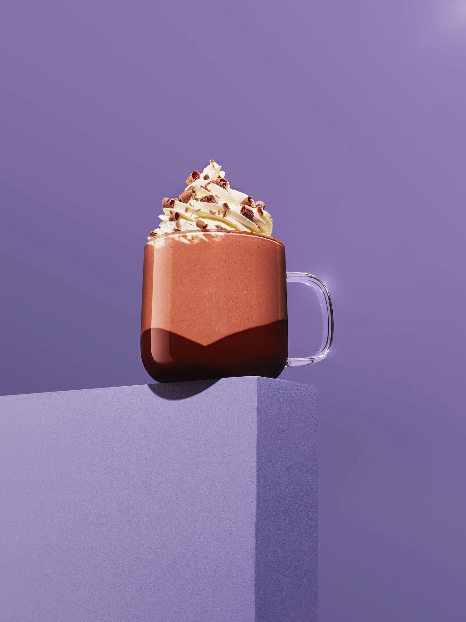 Bold, bright image of hot chocolate and cream, shot by Frankie Turner