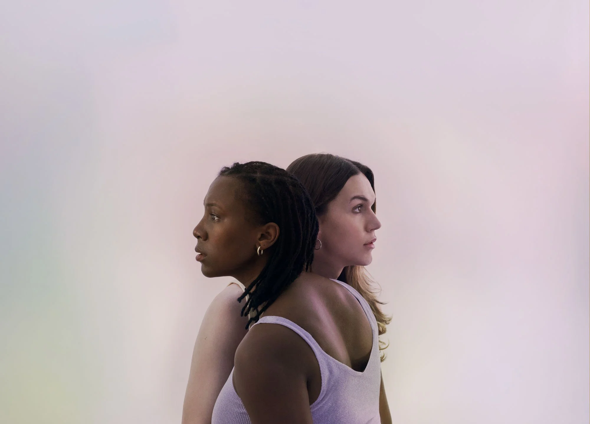 Jade Anouka and Fizz Sinclair in a portrait for Almeida Theatre’s Otherland, photographed by London-based photographer Phil Fisk