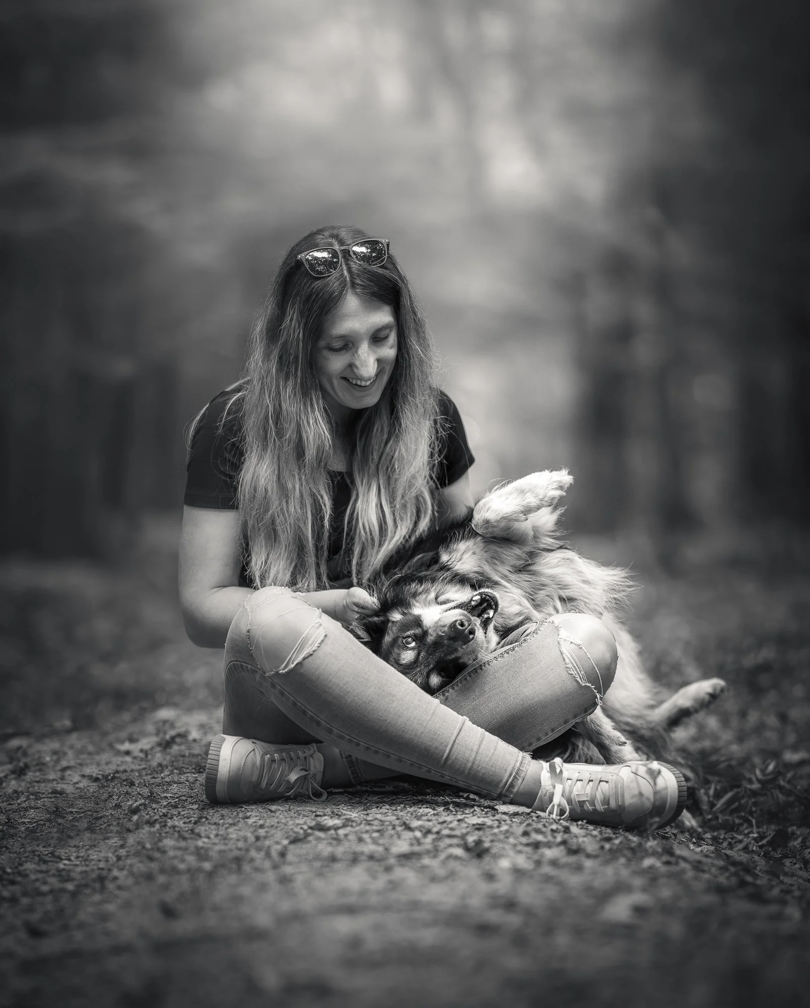 zwart wit hond border collie baasje portret