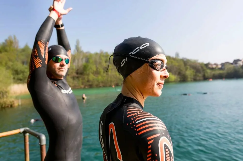 Super Sprint triathletes preparing for open water swimming using training zones to guide race effort