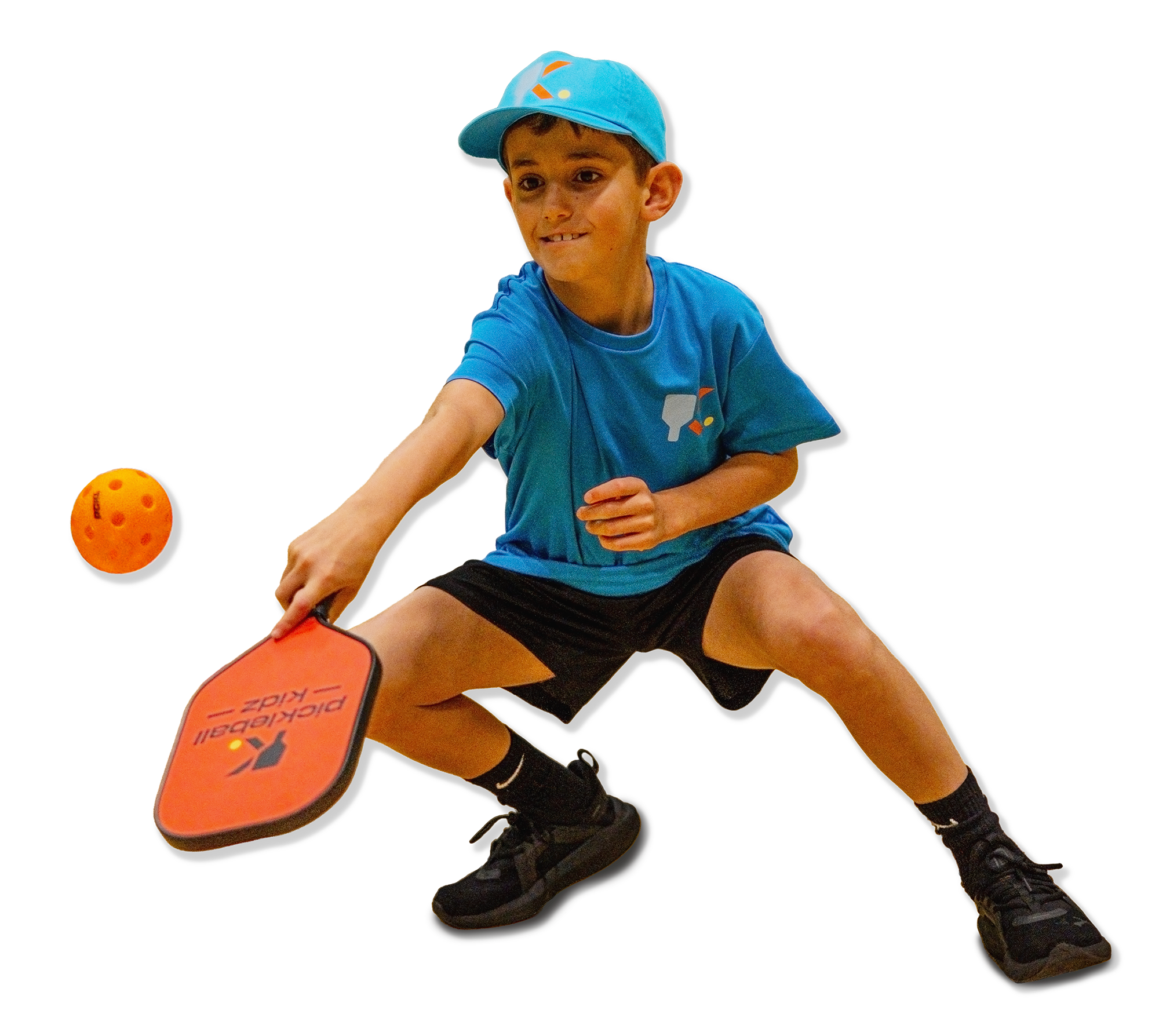 Child playing Pickleball