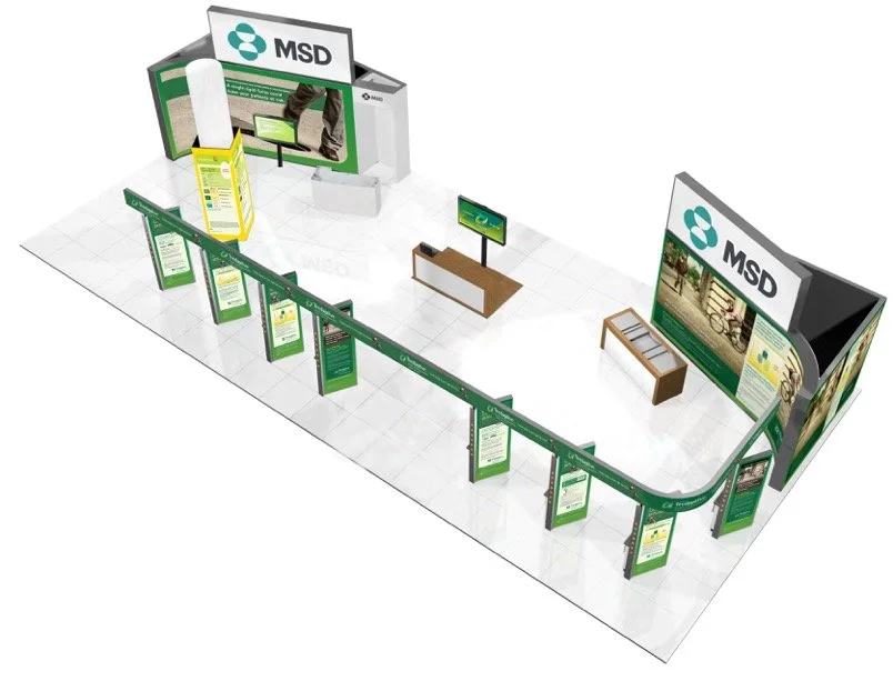Exhibition booth for MSD with informational display panels, digital screens, and seating area.