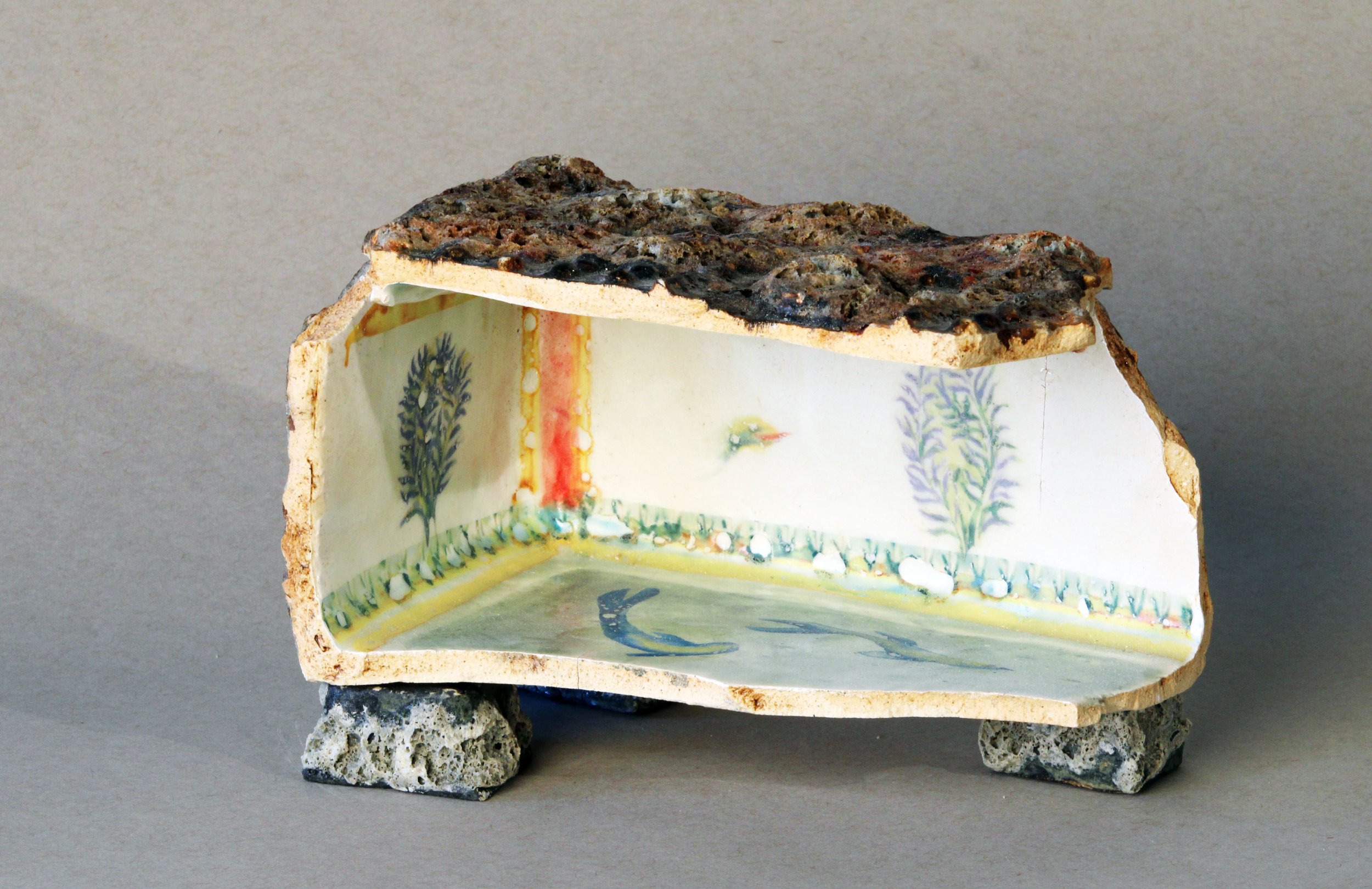   Box Fragment: Bushes with Snake and Fish,  2025 Stoneware, experimental glazes that include pumice dating to 79 AD, ceramic decal prints made from original watercolor paintings Approx. 8 x 2 x 4 iinches   