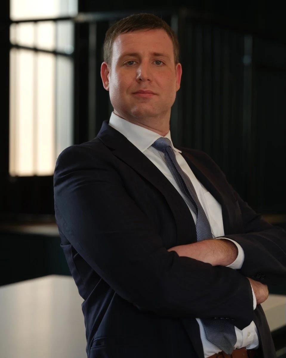 Headshot of Ross Wolfe, Esquire