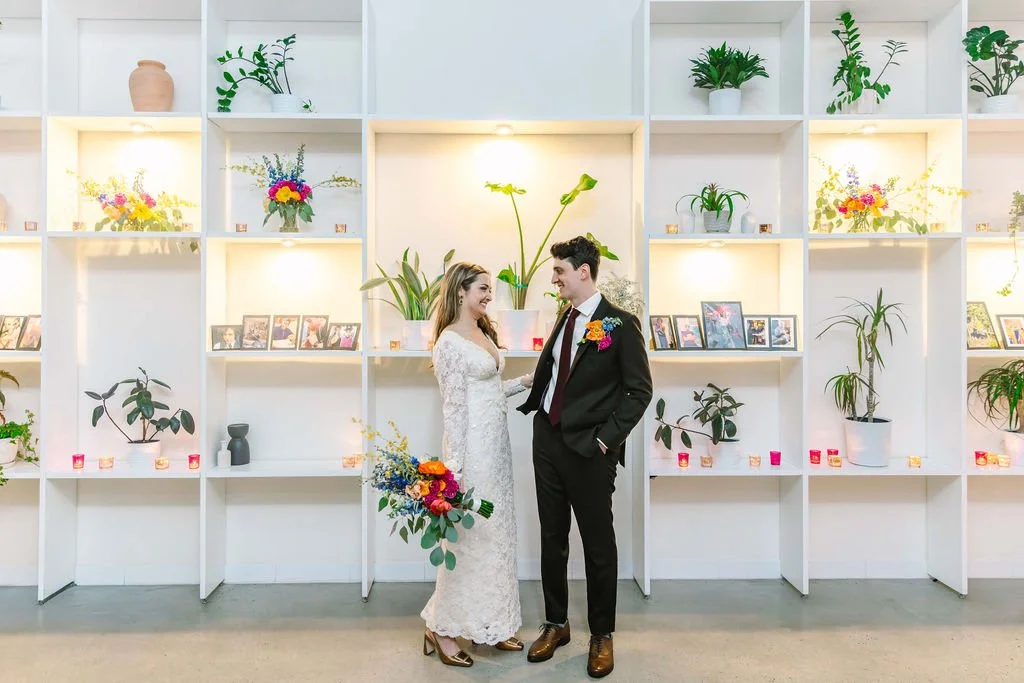 Pre-reception photo in front of our shelving unit