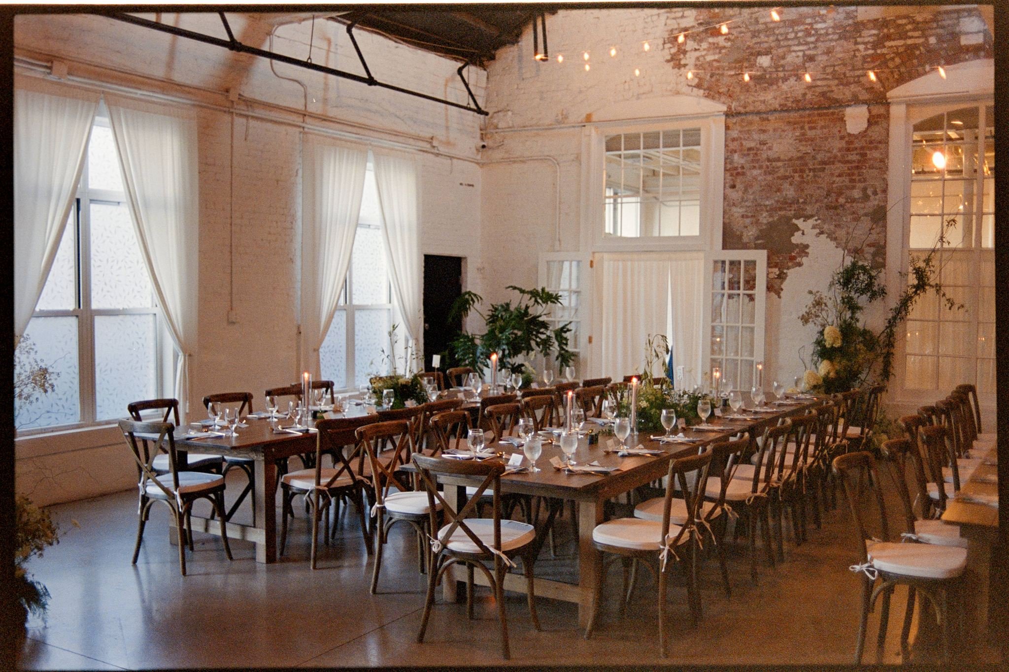Beautfiul farmhouse table set up for reception