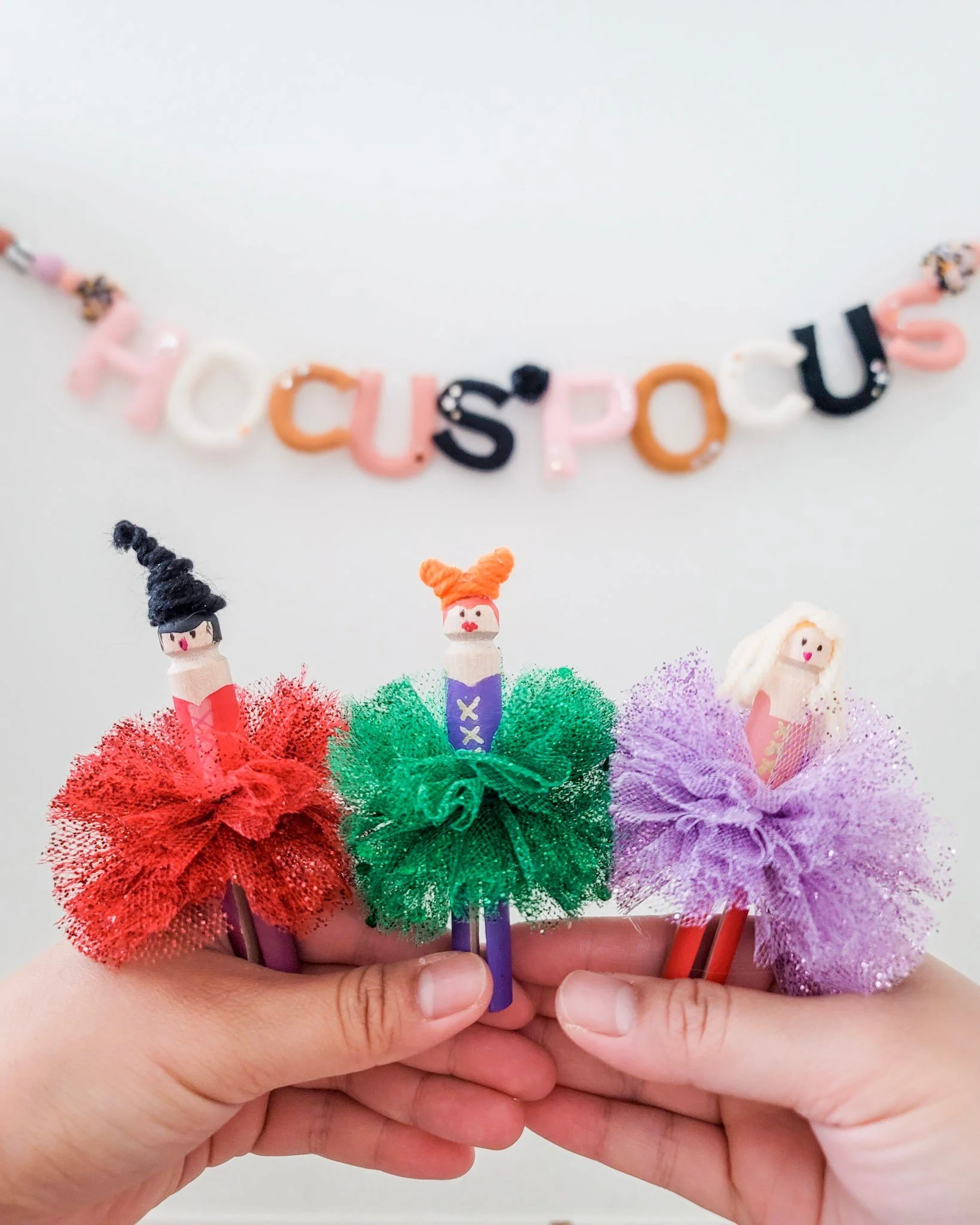 DIY Clothespin Dolls dressed as Hocus Pocus witches