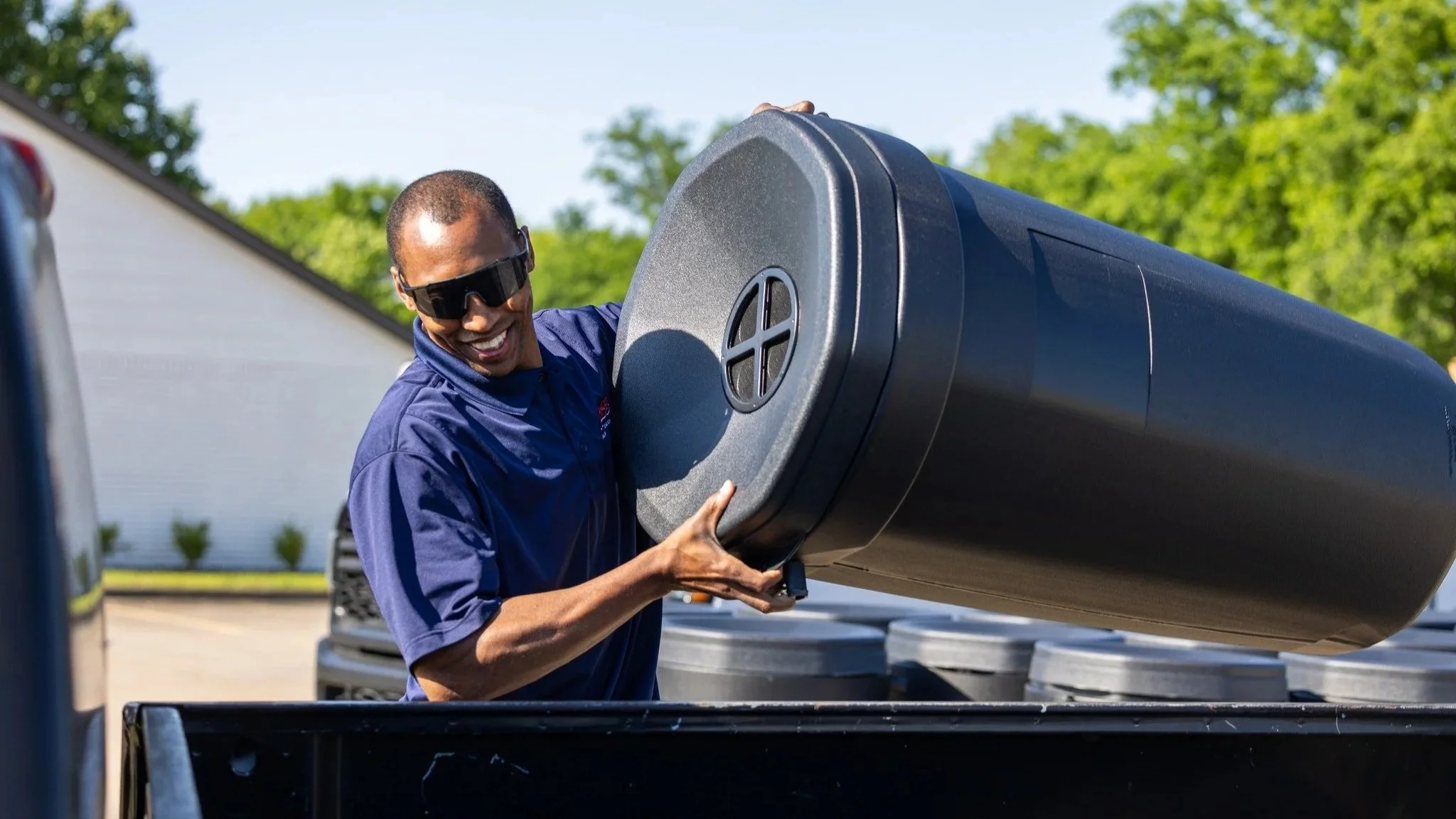 Owasso Public Works staff hands out over 90 discounted spring rain barrels 