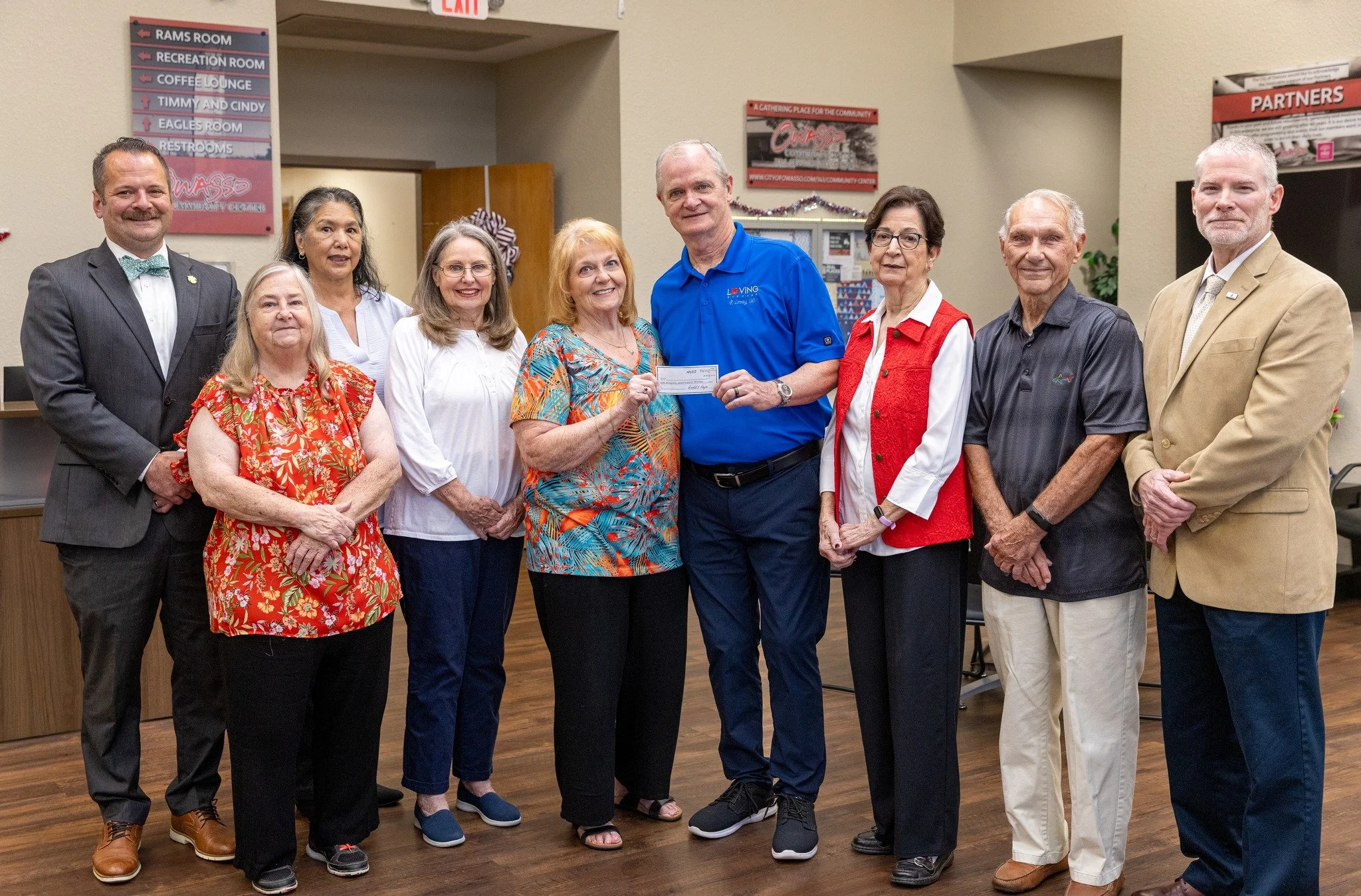 Owasso city staff officially receive $486K check from Owasso Golden Agers