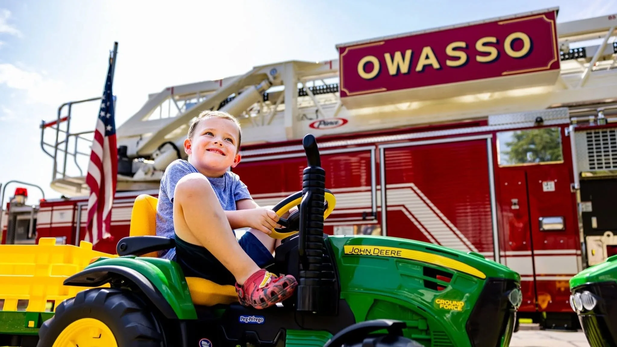 Owasso firefighters gift twins new motorized tractors after losing them in fire