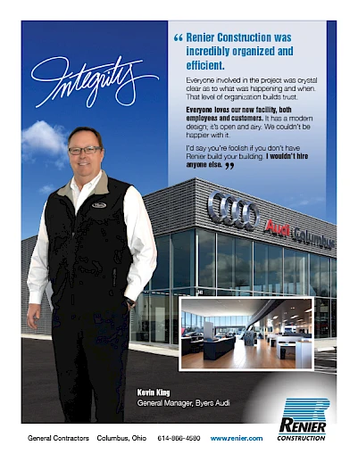 A smiling man wearing glasses and a black vest over a white shirt standing in front of a modern Audi dealership building with the Audi logo. The image includes a quote praising Renier Construction, a photo of the dealership's interior, and text shari