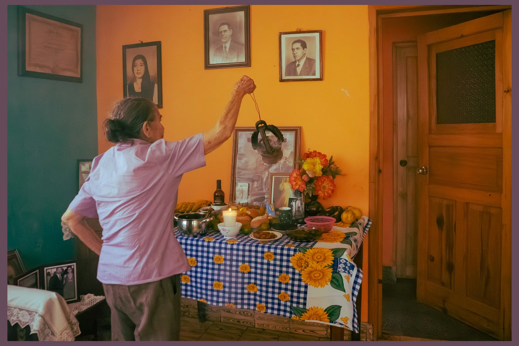 Grandma Giving Food Offerings to our Ancestors on El Día de los Muertos, 2022