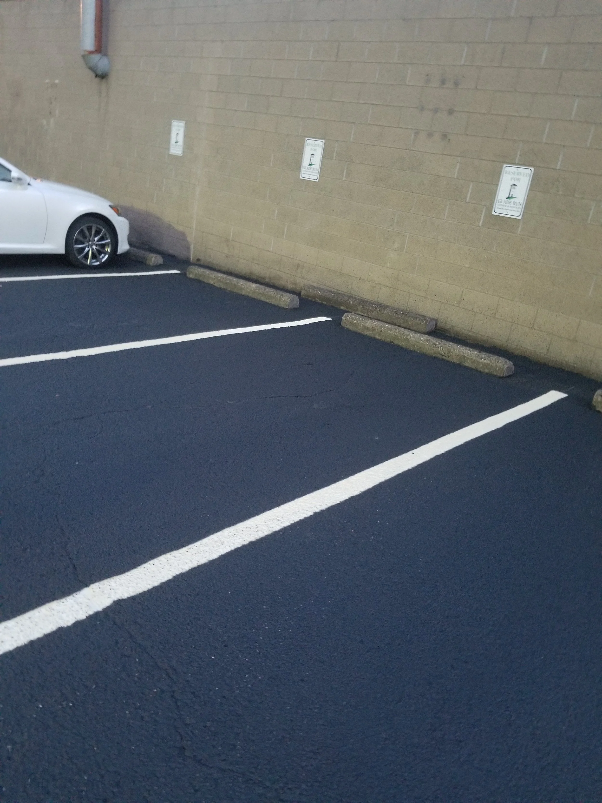 Parking Lot Sealcoating and Line stripe