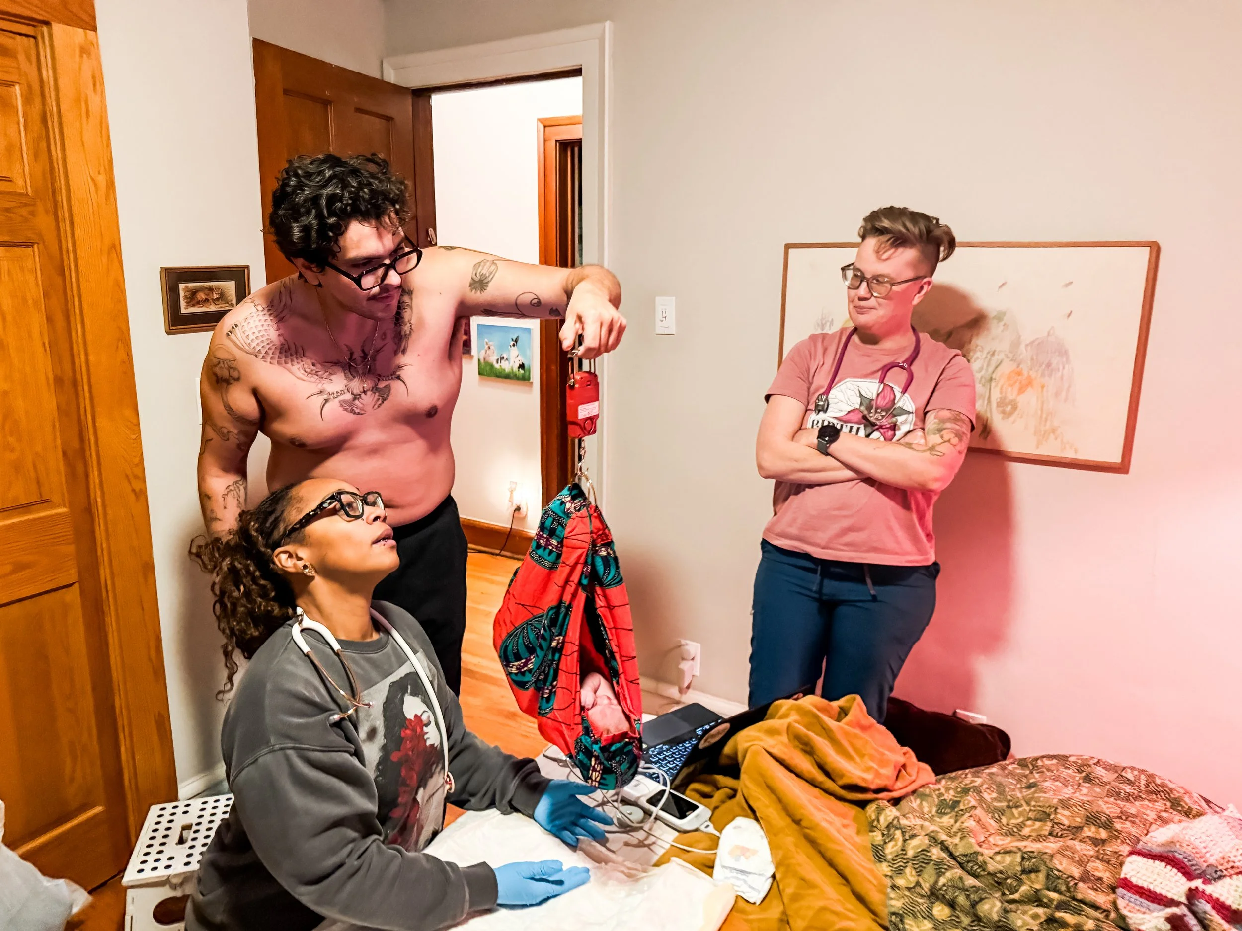 Midwife Corrine Westing at a home birth in Chicago, taken by queer doula Mel Haley