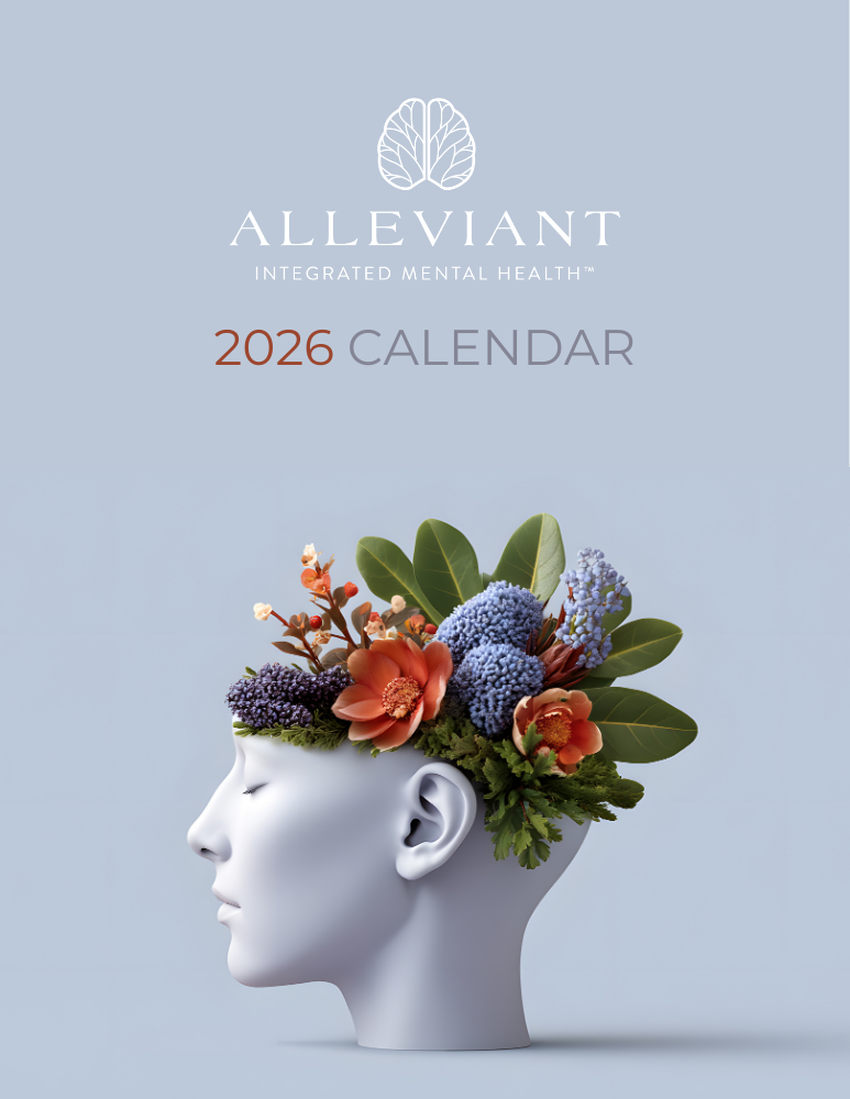 2026 Alleviant Integrated Mental Health calendar cover featuring a profile of a white head with colorful flowers and green leaves emerging from it against a light blue background.