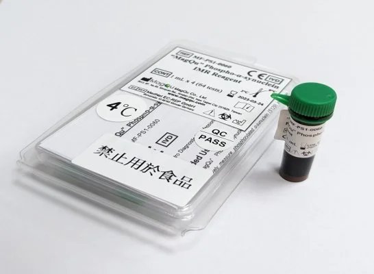 A clear plastic container holding a passenger's airline boarding pass and a small vial with a green cap, containing a dark liquid.