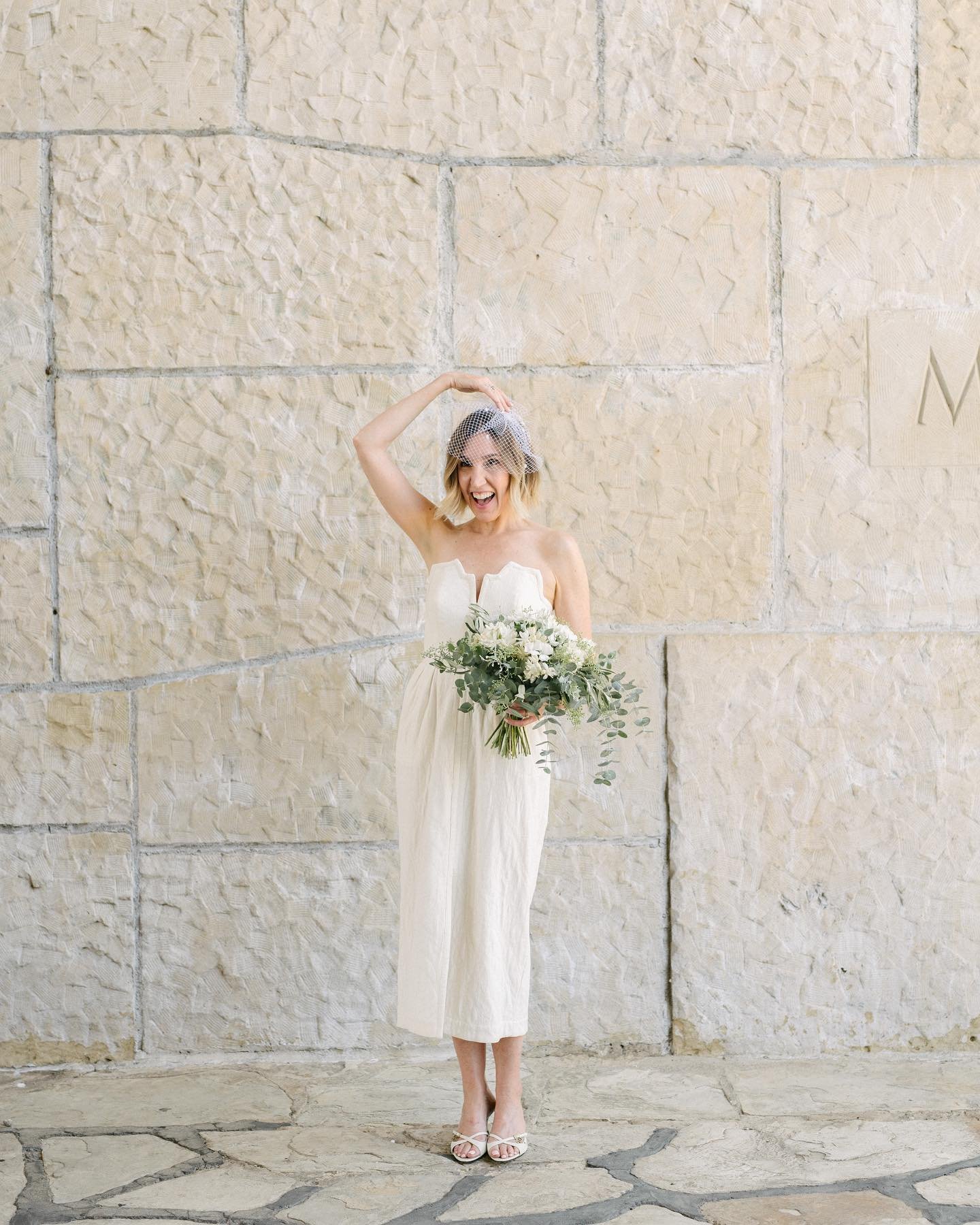 on her wedding day 🤍 (with her husband cheering her on just off camera🥰)
