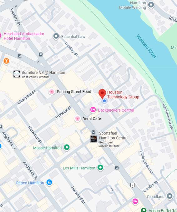 Map of downtown Hamilton with locations of hotels, cafes, stores, and the Hamilton River visible.