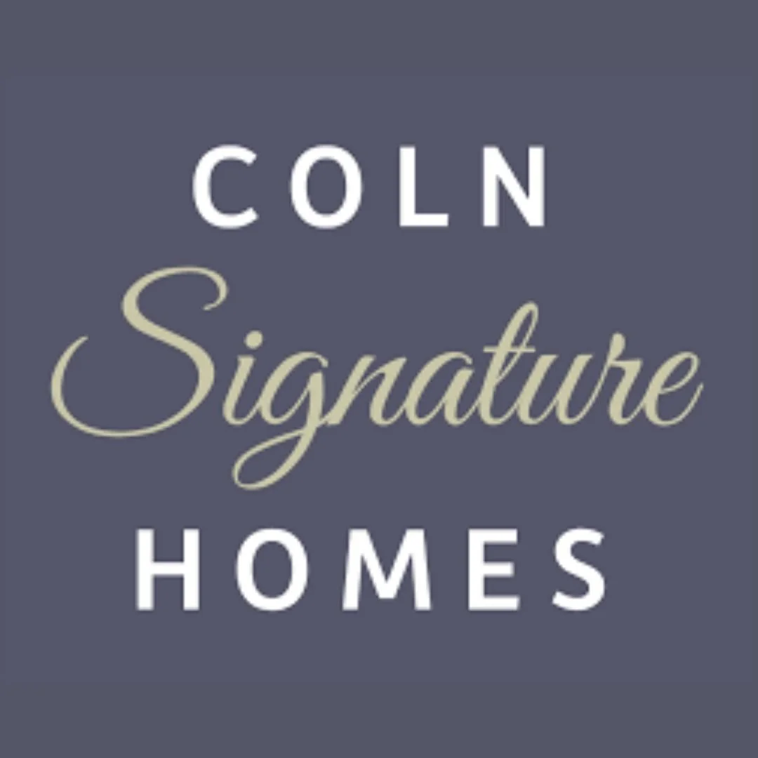 Logo with text reading "Coln Signature Homes" on a dark gray background.