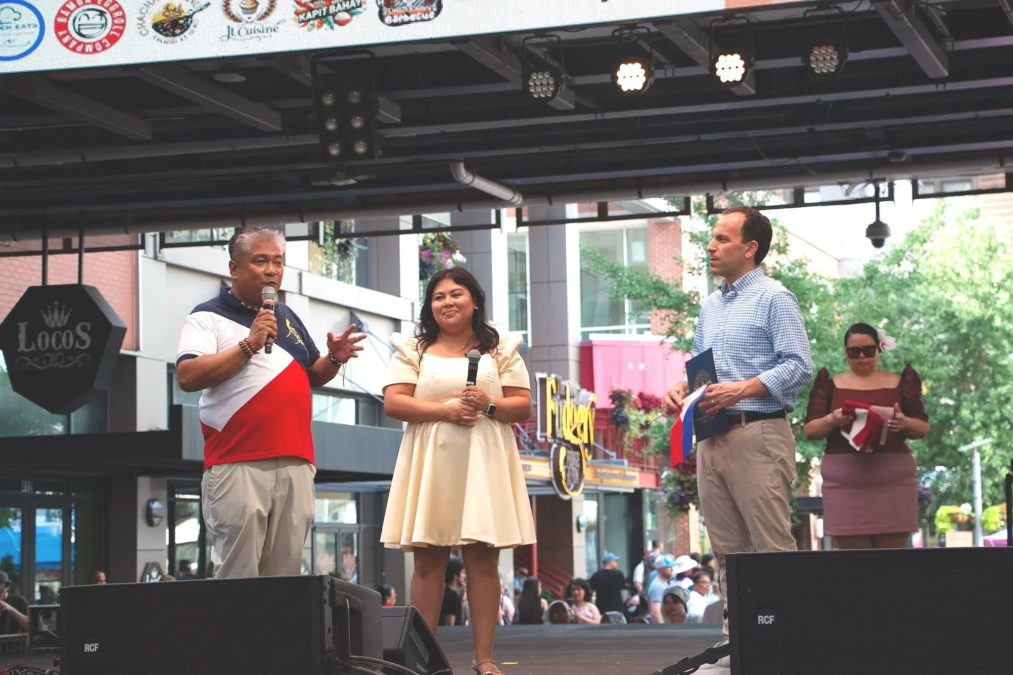 Joel Buno, Joy Lanceta Coronel, Mayor Craig Greenberg. (Photo by McKenzie Gary, 2026.)