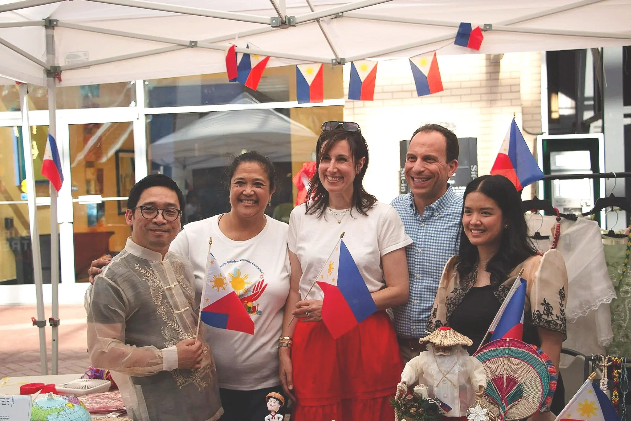 Mayor Greenberg and First Lady Rachel Greenberg stop by the Filipino cultural booth. (Photo by McKenzie Gary, 2026.)
