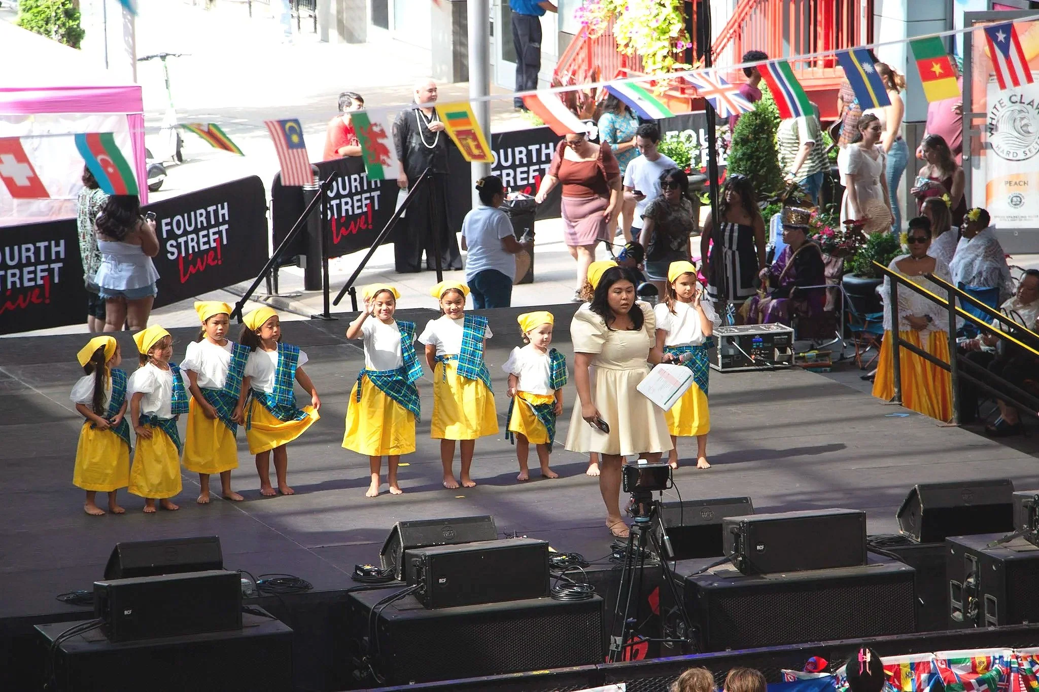 Cultura Philippines dancers prepare for "Itik-Itik." (Photo by McKenzie Gary, 2026.)