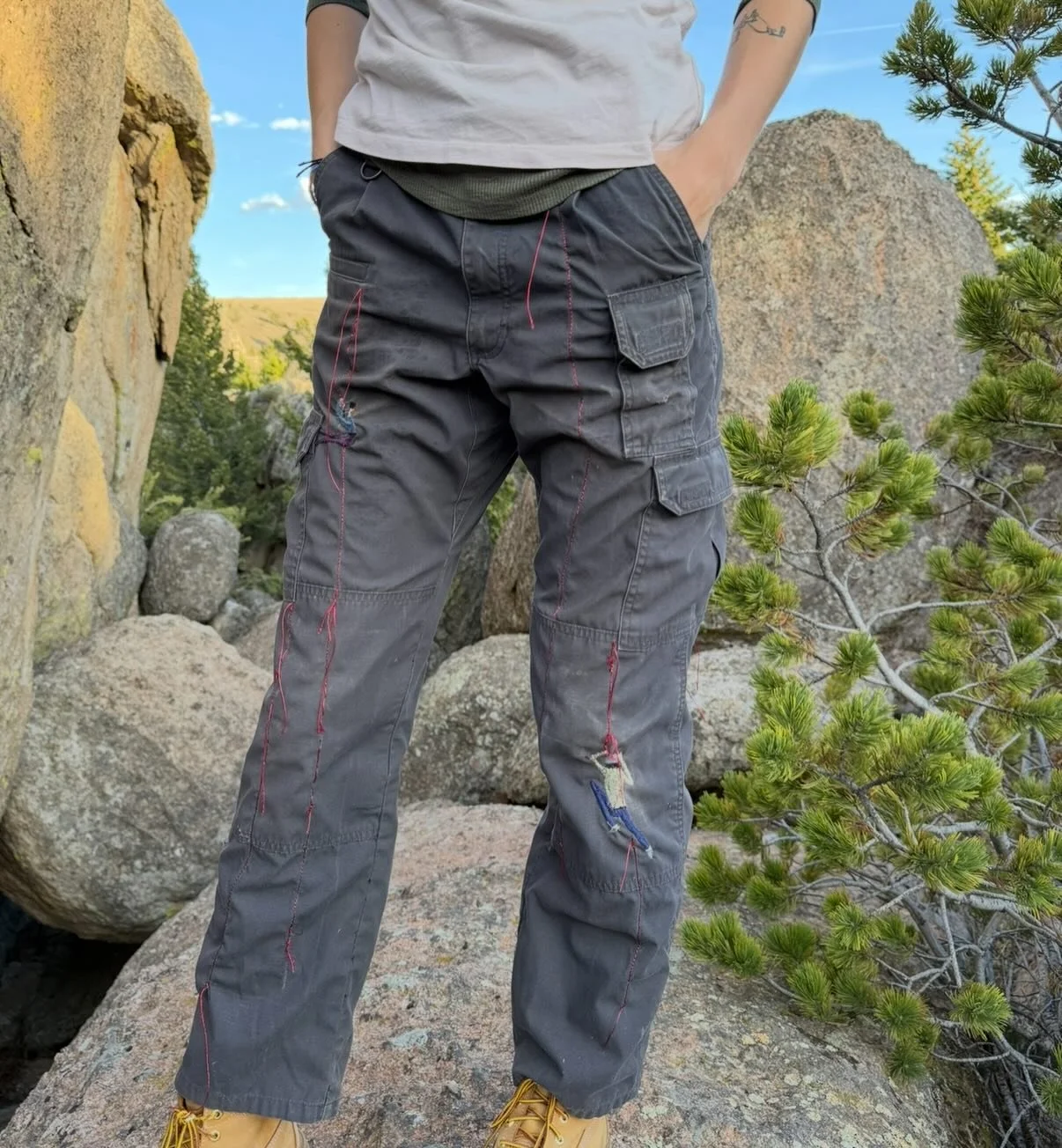 These are a rough draft of a vision I had to get out. Found these busted up cargos and embroidered climbers by hand with real rope for the climbers. I am currently working on another pair using shoelaces which is currently in the works:) 
&bull;
&bul
