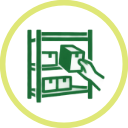 Person reaching into a box of books on a bookshelf