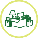 Icon of a cozy living room with a lamp, chair, and boxes