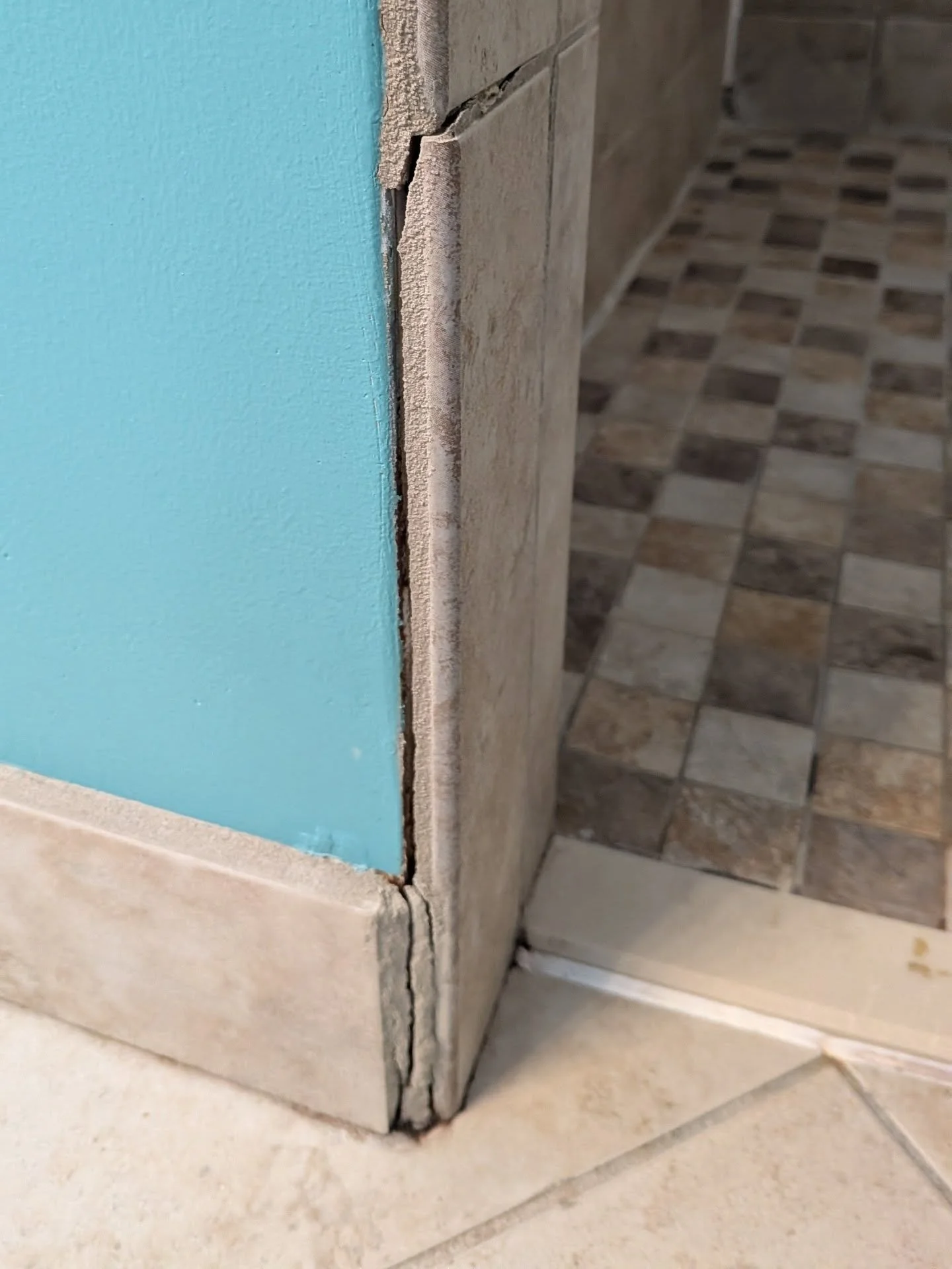 I've been asked to do several tile repairs recently. This one's ready for some touch up paint! It's especially important to repair tile in a shower because water will find a way into the walls and floor and will cause a lot more expensive damage over