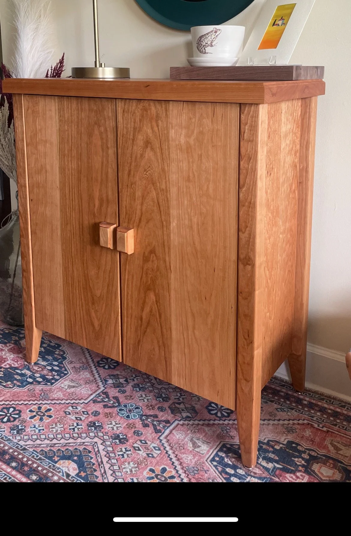 This is a cabinet made entirely of solid cherry.