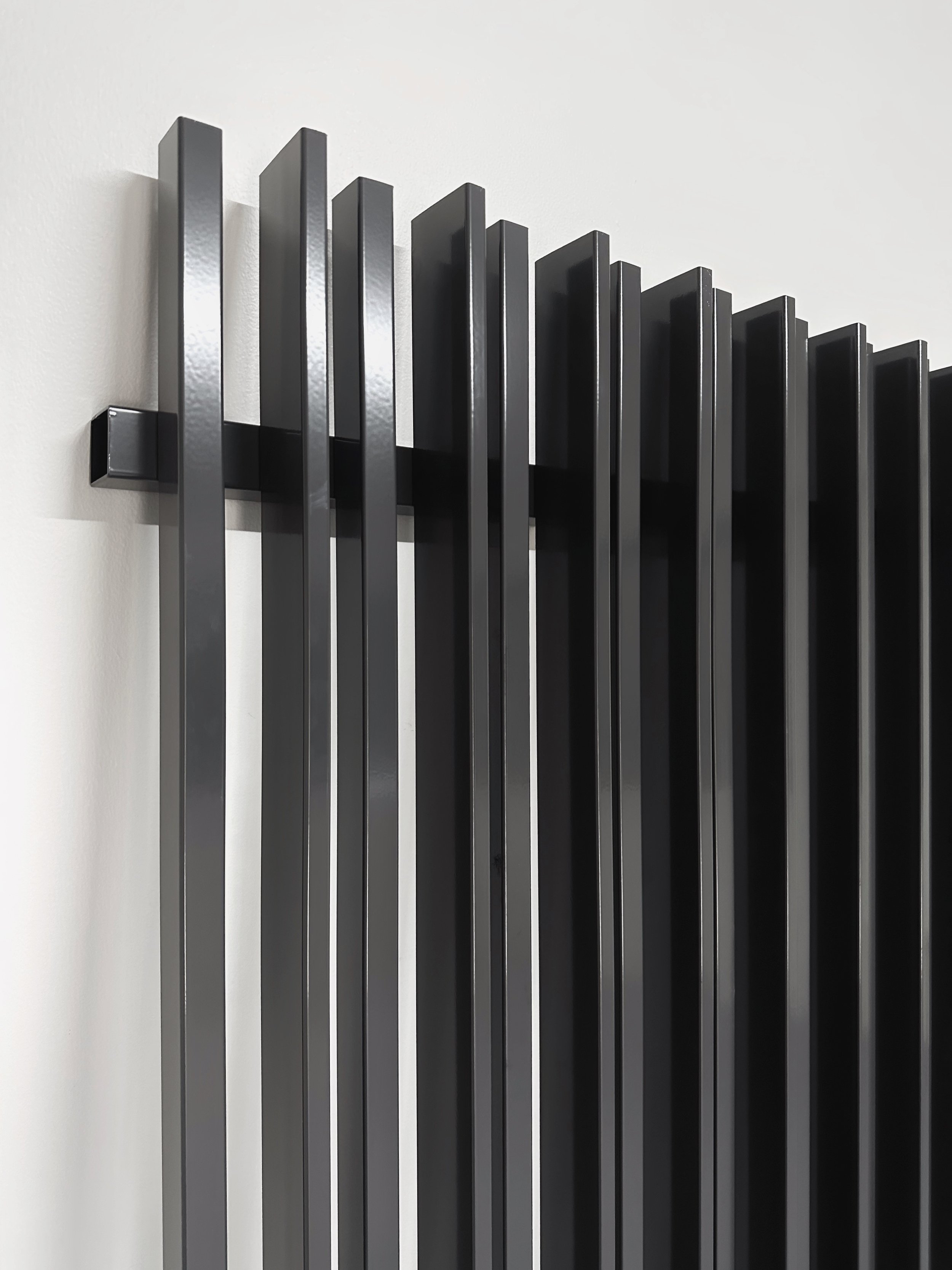 Powder coated in Monument Color - a dark charcoal suitable for any exterior and works well with contemporary and modern homes (COLORBOND®).
65×16 and 38×25 aluminium hollow sections.
Aluminium fence panels, gates, screenings. custom made to order.