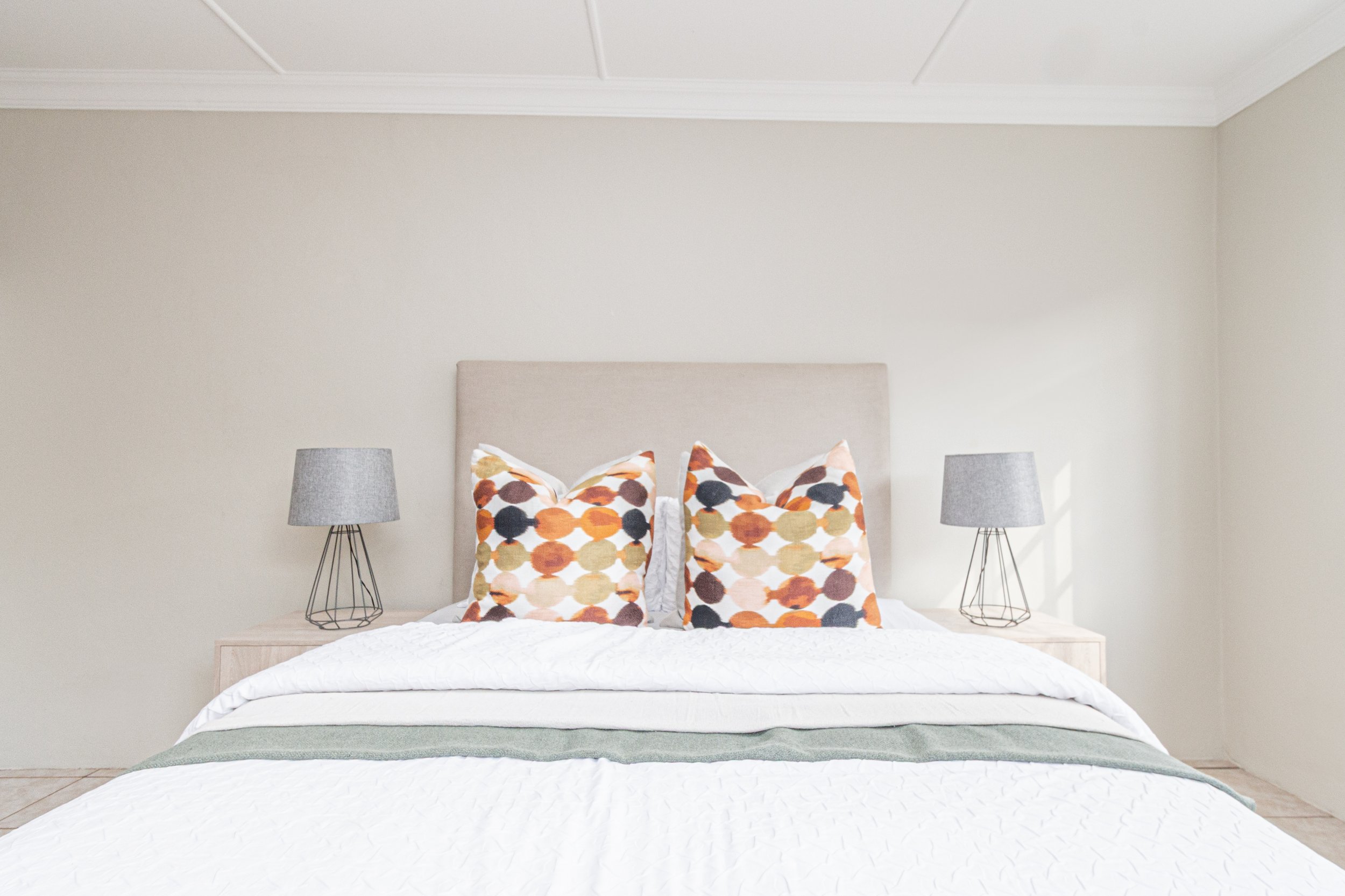 main bedroom with warm contemporary interior design