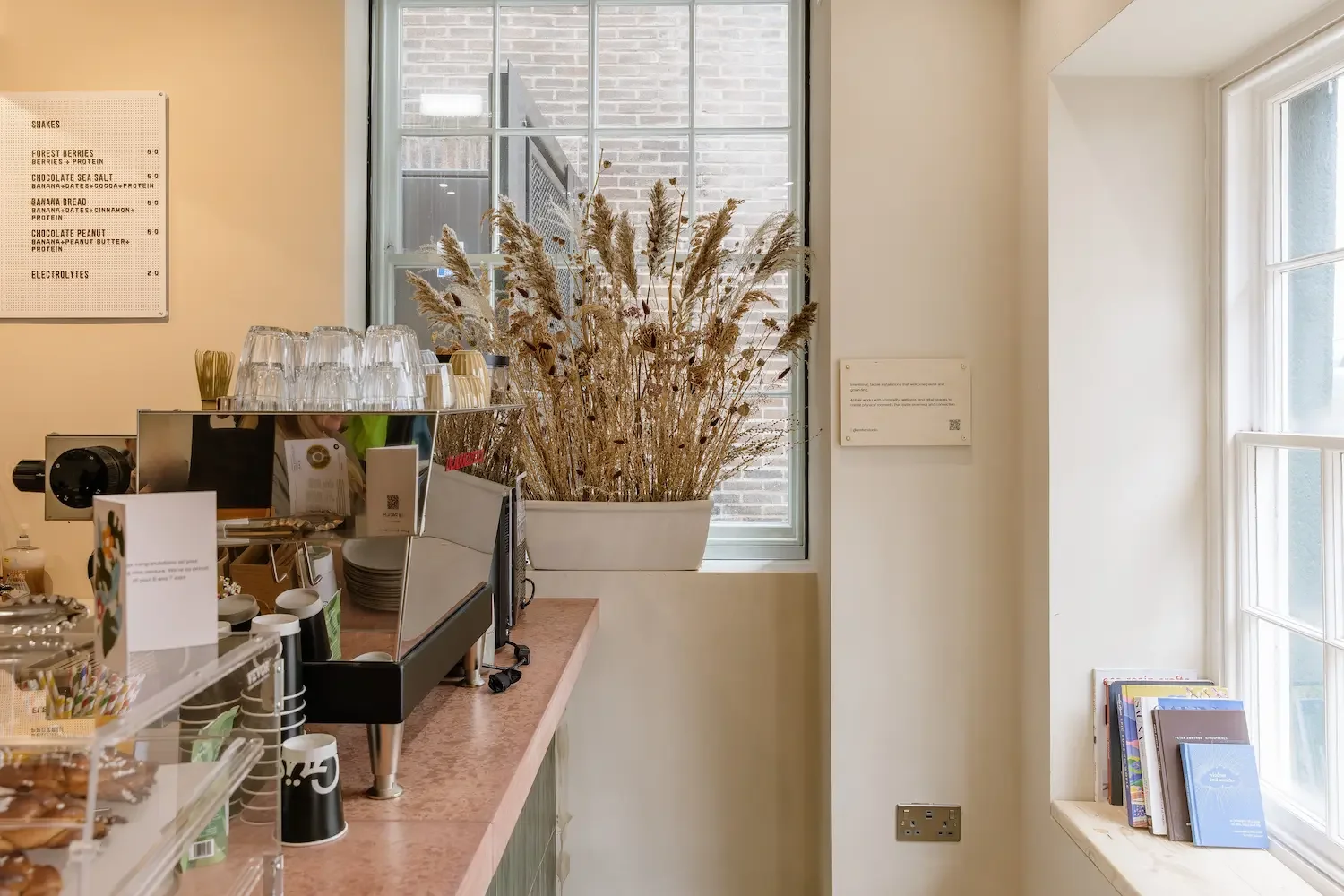 Dried grass and pampas arrangement beside the coffee bar at Gus, Sheffield