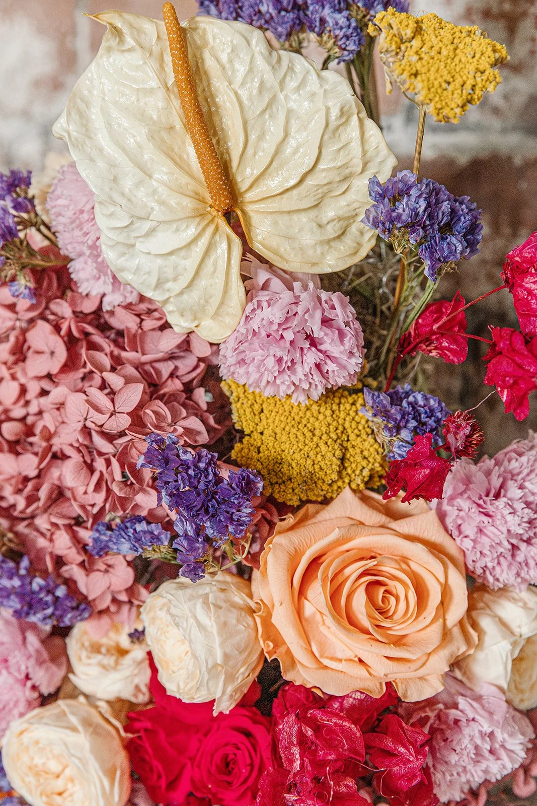 Close up of preserved anthurium and roses in preserved flower arrangement