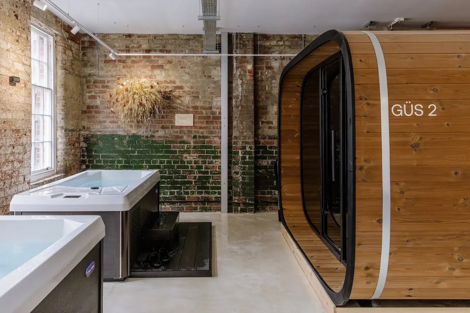 wild dried grasses wall installation in sauna and wellness space
