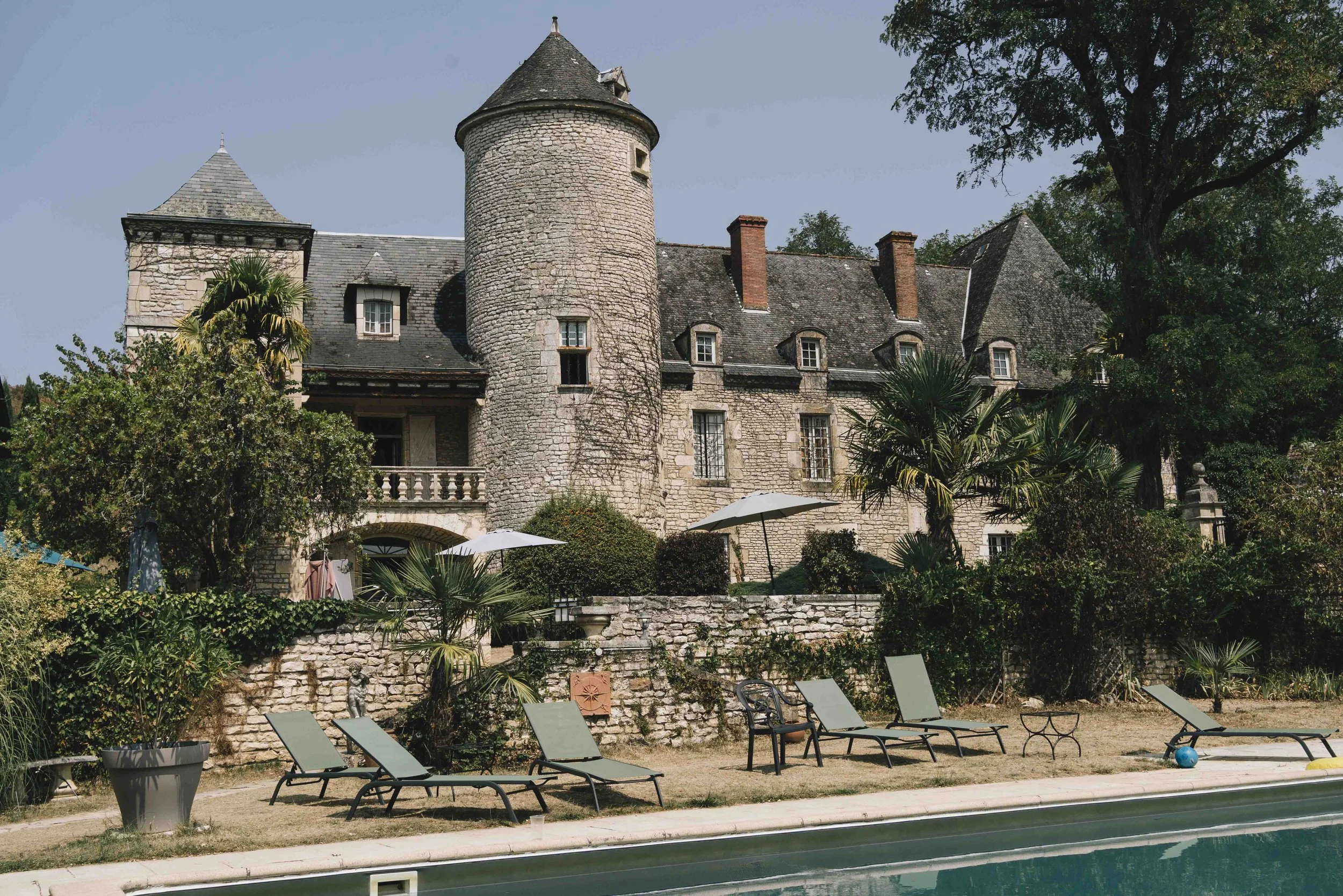 Stone château with pool in the Dordogne, a popular wedding venue in southwest France