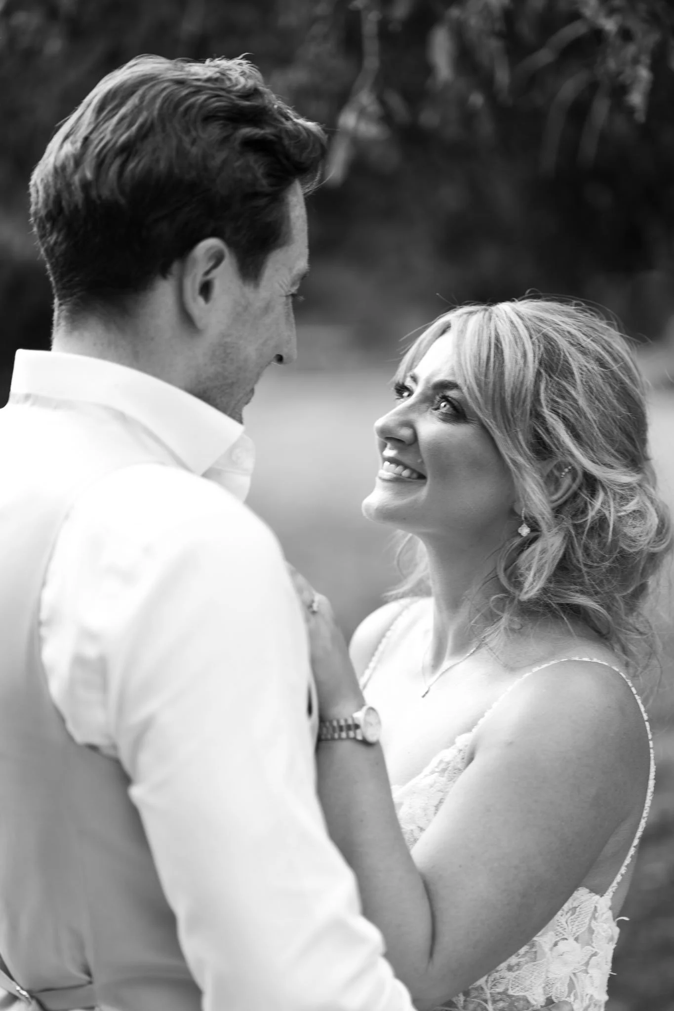 Black and white close portrait of bride and groom at Château du Raysse, Dordogne